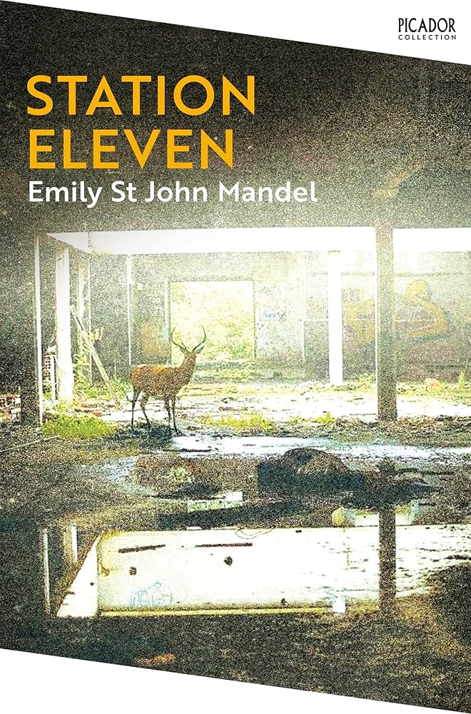 Station Eleven by Emily St John Mandel a abandoned building with graffiti on the walls, dust in the atmosphere, with a dear staring at you from a distance, the image is very grainy.